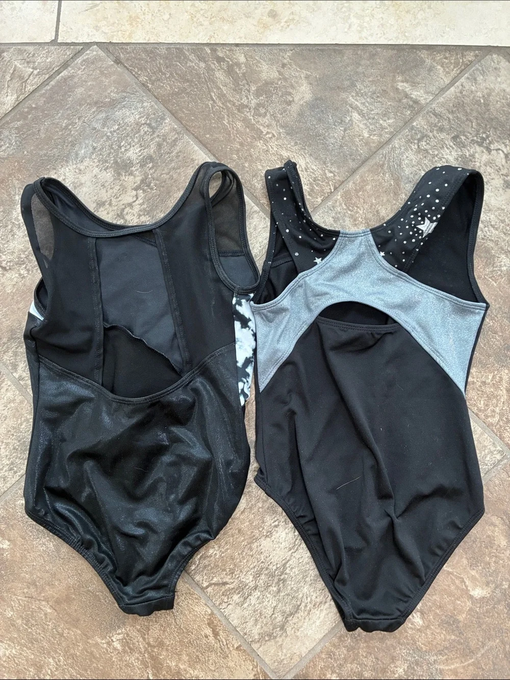 More than Magic set of two gymnastics/dance leotards with matching shorts.
